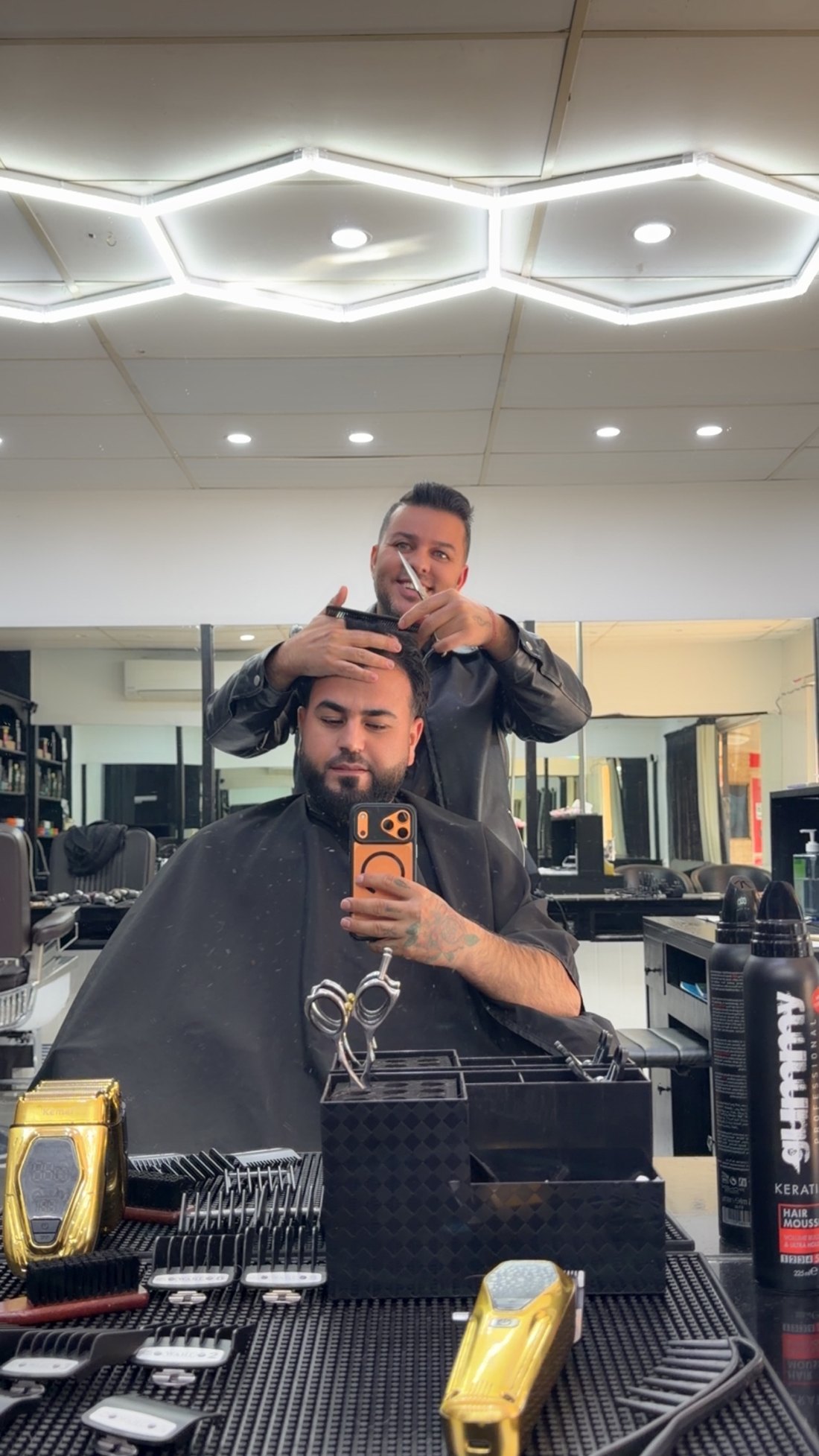Scissor work on the top, finishing a cut