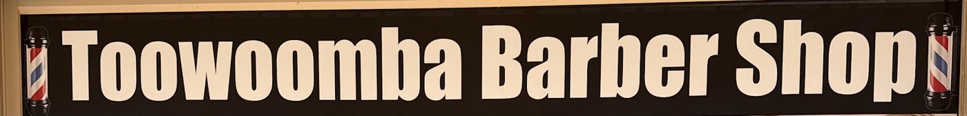 The Toowoomba Barber Shop sign above the shop window on Spring Street